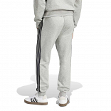 ESSENTIALS THREE STRIPES FLEECE PANTS