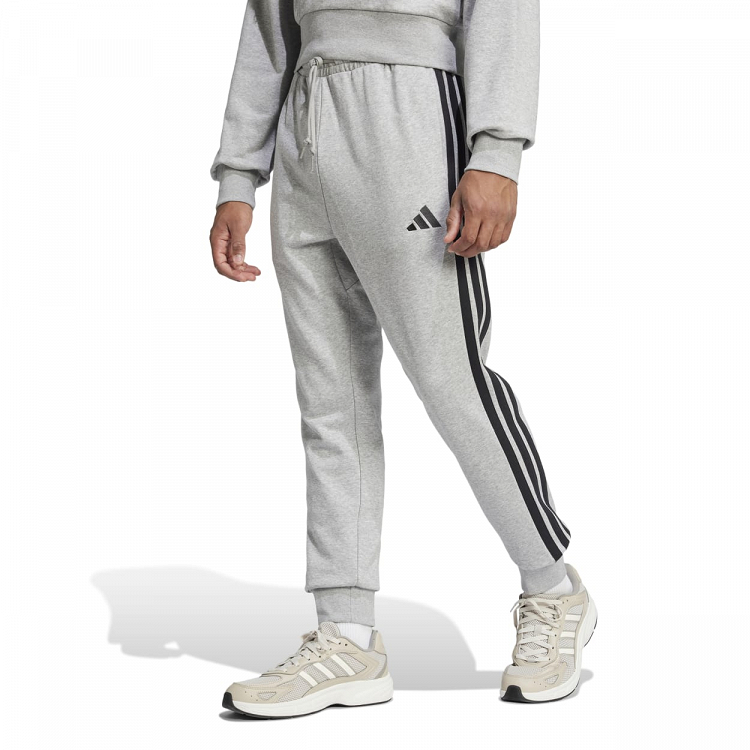 ESSENTIALS THREE STRIPES FRENCH TERRY PANTS