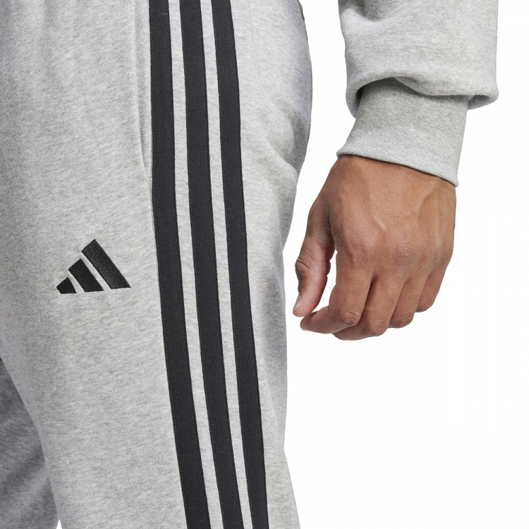 ESSENTIALS THREE STRIPES FRENCH TERRY PANTS