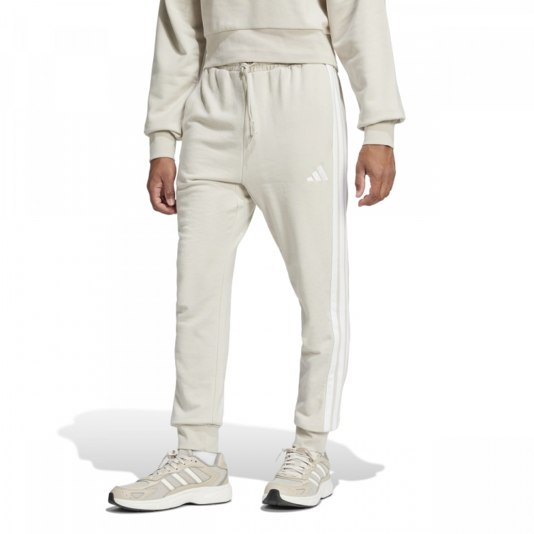 ESSENTIALS THREE STRIPES FRENCH TERRY PANTS
