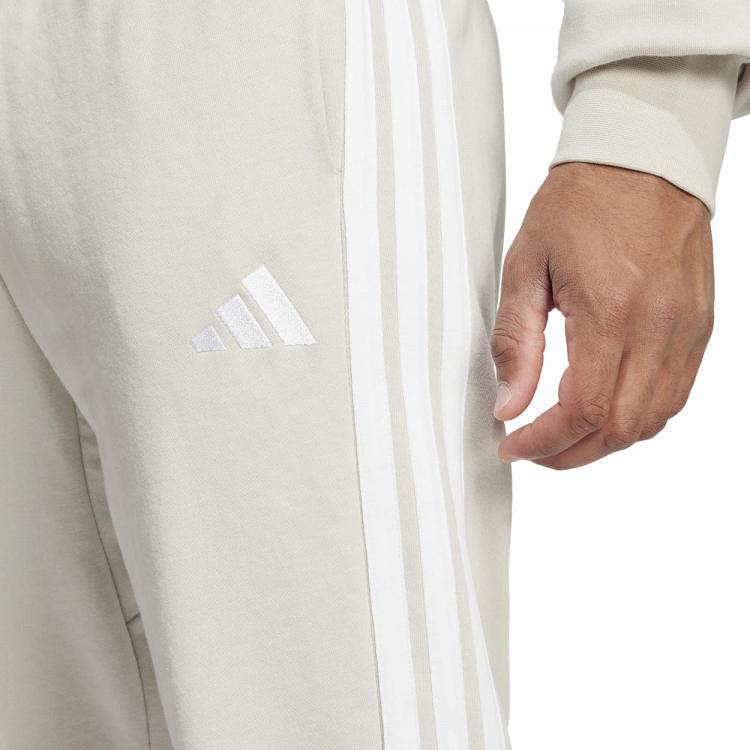 ESSENTIALS THREE STRIPES FRENCH TERRY PANTS