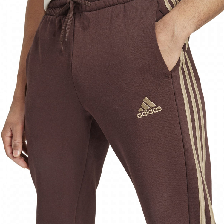 ESSENTIALS FLEECE TAPERED CUFF 3-STRIPES PANTS